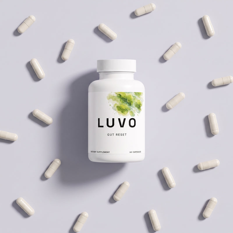 LUVO Gut Reset bottle surrounded by scattered white capsules